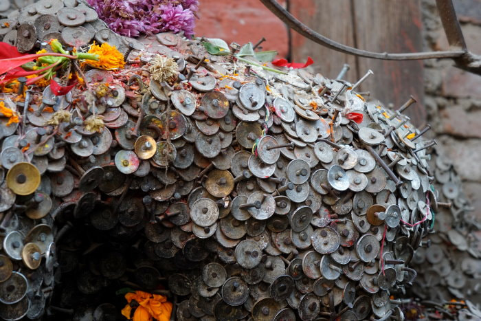 Kathmandu Temple - Coins Offered for Healing