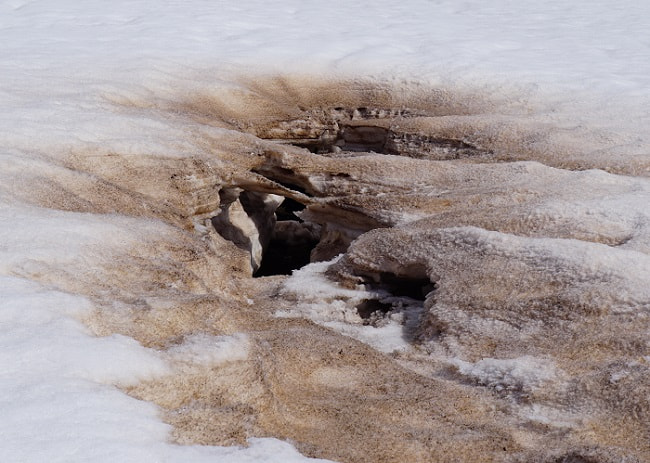 Bjólfur water under snow