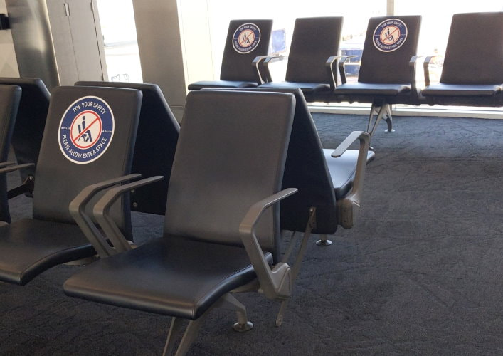 Airport Waiting Area Seats Blocked Off for Social Distancing